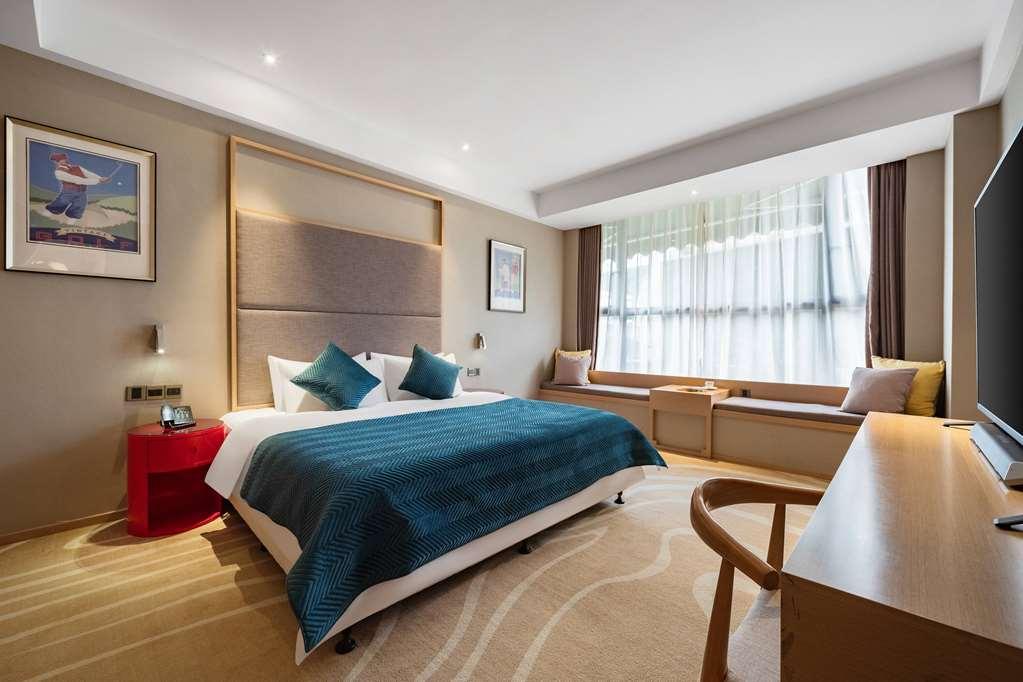 Ramada Encore Jintang Ченду Номер фото