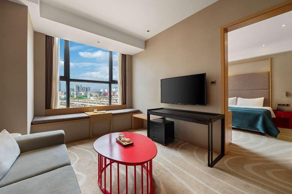 Ramada Encore Jintang Ченду Номер фото