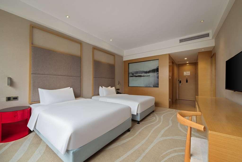 Ramada Encore Jintang Ченду Номер фото