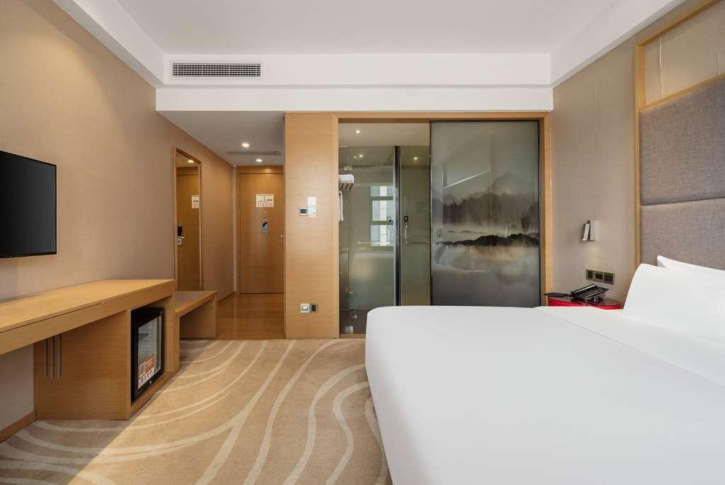 Ramada Encore Jintang Ченду Номер фото